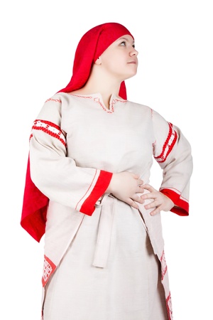 Young Russian woman posing in national clothes. Isolated over white background.の写真素材