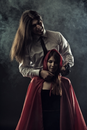 Red Riding Hood with furious Bad Wolfの写真素材