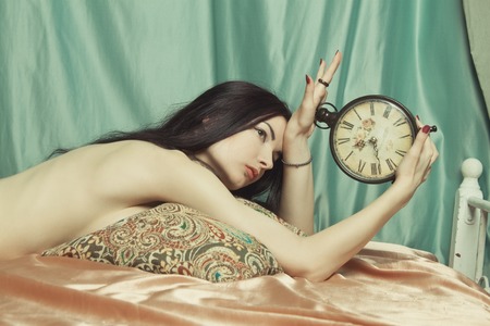 Naked woman waking up in the morningの写真素材