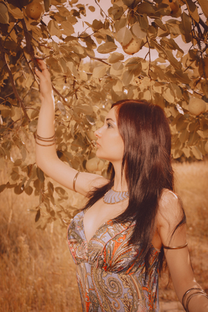 Pretty asian girl posing in  a gardenの写真素材