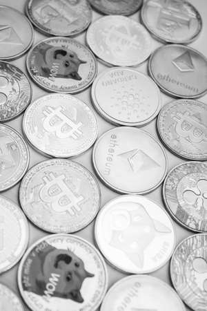 Cryptocurrency coins (altcoins and bitcoins) over white background.の写真素材