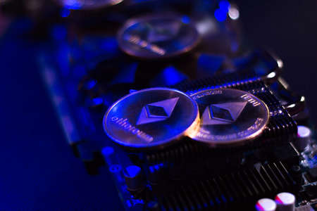 Ethereum coins on graphic videcard in neon lights