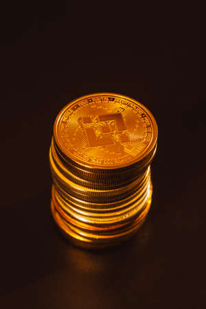 Stack of binance coins over dark backgroundの写真素材