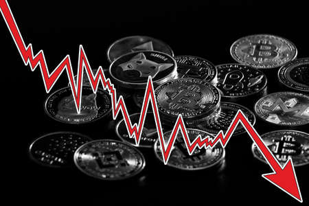 Crypto market crushing concept. Cryptocurrencies over dark background.