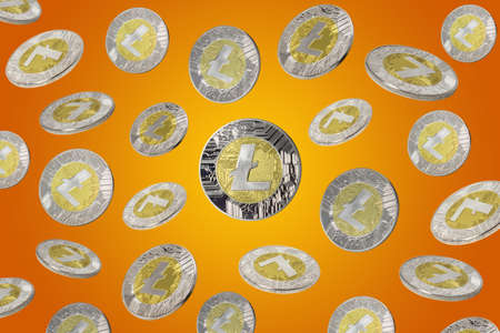Litecoins over orange background. Cryptocurrency concept.の写真素材