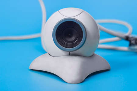 Black webcam over blue backgroundの写真素材