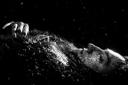 Dead northern warrior laying in snow.の写真素材