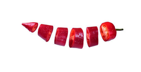 flying red pepper on white backgroundの写真素材