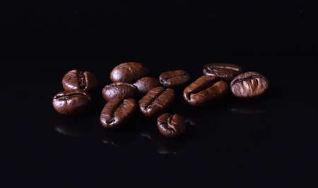 coffee beans on black background