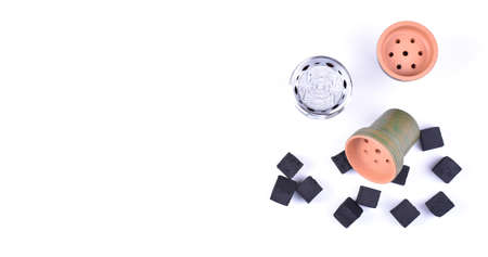 Hookah bowls with tobacco and charcoal for smoking on a white background. Space for text. Bannerの写真素材