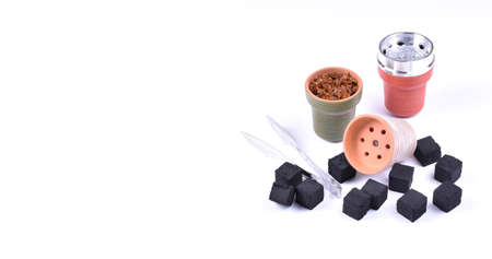 Hookah bowls with tobacco and charcoal for smoking on a white background. Space for text. Bannerの写真素材
