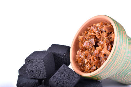 Hookah bowls with tobacco and charcoal for smoking on a white background. Space for text. Bannerの写真素材