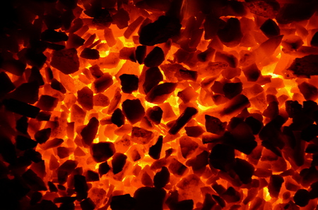 Sticking background of burning coal anthracite.の写真素材