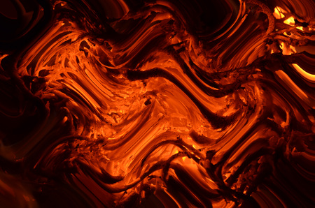 Abstract graphic resource in orange and dark lights.の写真素材