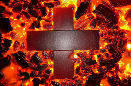 Abstract background, imitating a metal cross and red hot coal.の写真素材