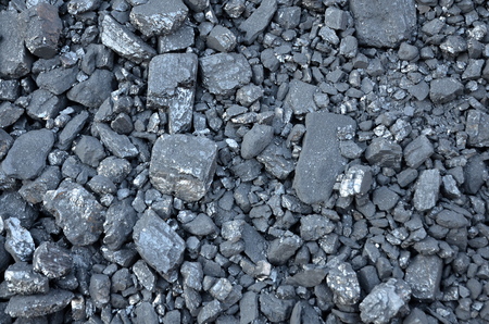 Sifted coal Anthracite of various sizes lies in bulk.