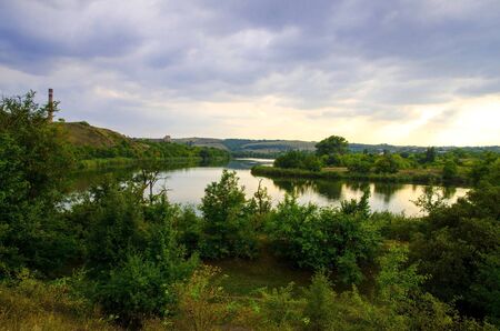 Water landscape in cloudy weather on a summer day.