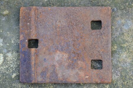 Old rusty railway lining as a background.