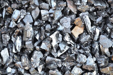Coal anthracite enriched with a small variety of glitters.