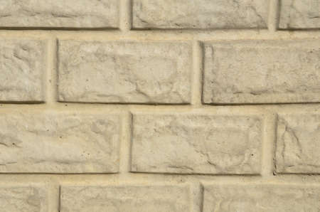 The graphic resource consists of the surface of a concrete slab molded into brickwork.