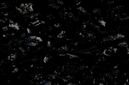 Dark background from fine stone texture.の写真素材