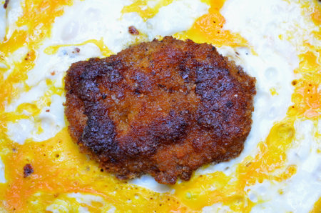 Meatballs filled with scrambled eggs.