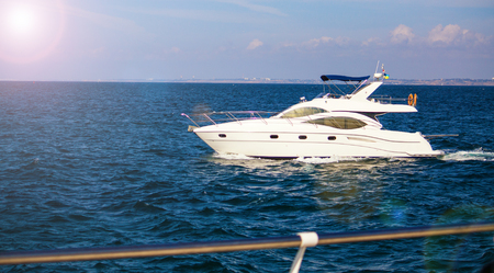 A luxury private yacht under way in the sea.の写真素材