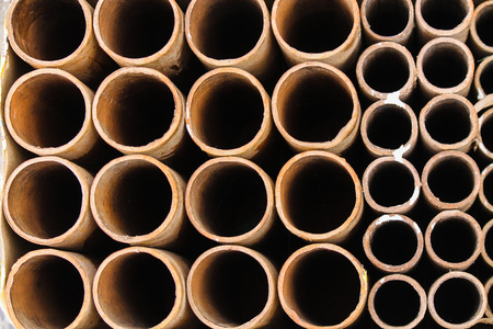 used fireworks that look like Metal round pipes circles backgroundの写真素材