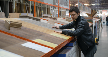 male customer choosinglaminateの写真素材