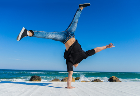 Handstand at the beachの写真素材