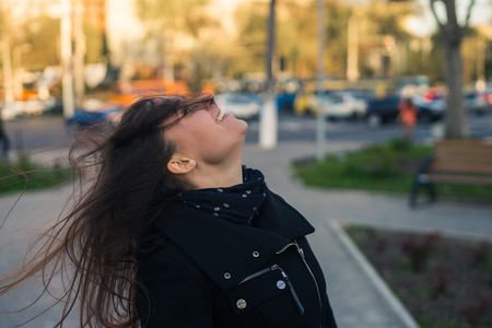 emotions of beautiful young girl in the cityの写真素材