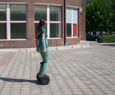 woman legs ride gyroscooter or hoverboardの写真素材