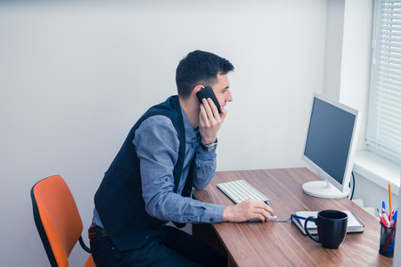 office worker takes an order by phoneの写真素材