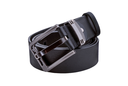 Rolled mens leather belt with metal buckle isolated on whiteの写真素材