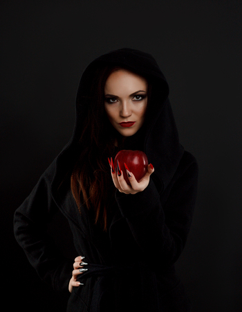 Stepmother witch gives poisoned red appleの写真素材