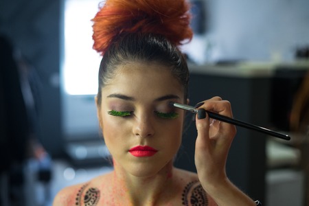 Body Art make-up to sexy fashion modellの写真素材