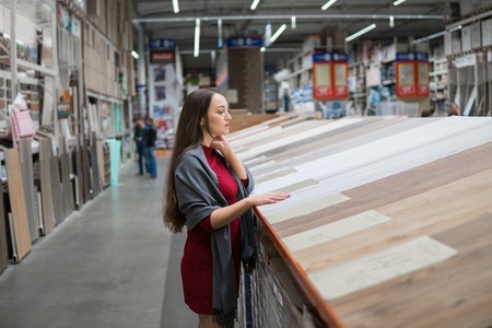 female customer choosinglaminateの写真素材