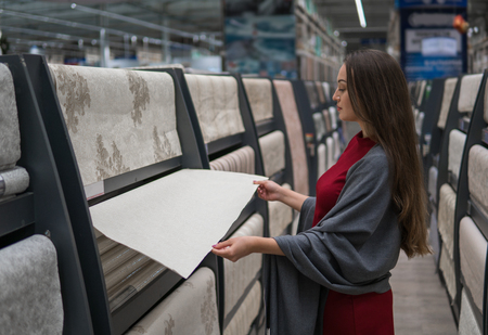 smart customer buying wallpaper in the car supermarketの写真素材