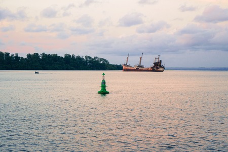 An old shipwreck or abandoned vessel agroundの写真素材