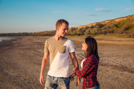 lovestory of couple on the beach On the Sunsetの写真素材