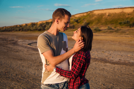 lovestory of couple on the beach On the Sunsetの写真素材