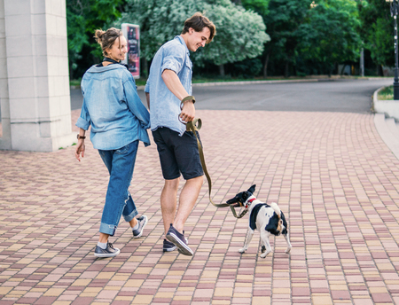 Lovely young hipster couple dating during summer sunset.の写真素材