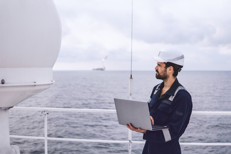 Service technician or serviceman near VSAT terminalの写真素材