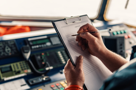 Marine navigational officer or chief mate on navigation watchの写真素材