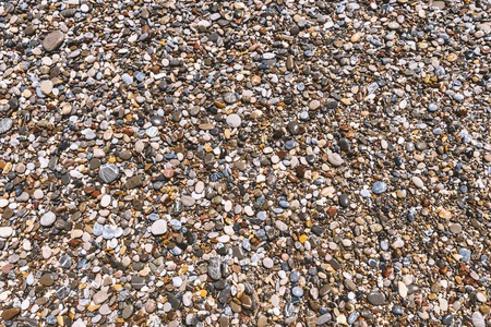Natural abstract texture - different colorful pebbles backgroundの写真素材