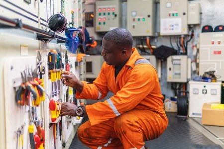 Marine engineer officer working in engine room