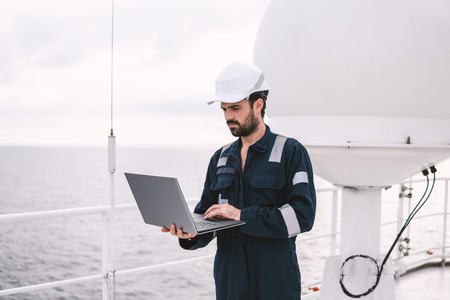 Service technician or serviceman near VSAT terminalの写真素材