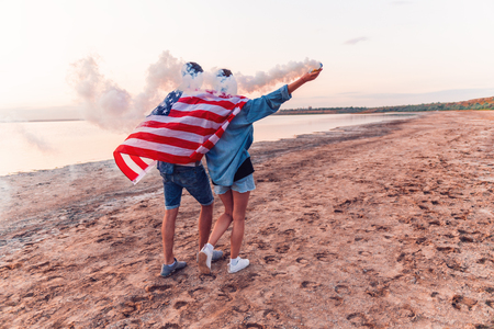 american couple with hand flare or fuseeの写真素材