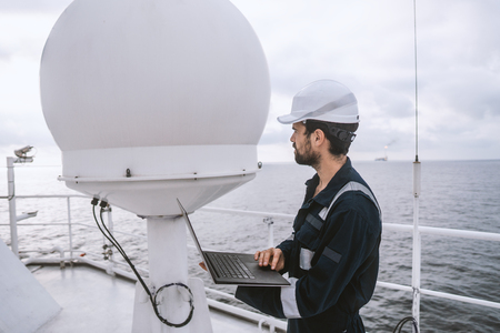 Service technician or serviceman near VSAT terminalの写真素材