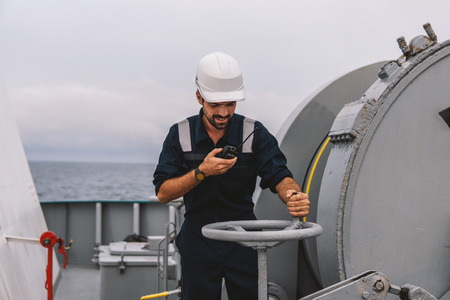 Marine Deck Officer or Chief mate on deck of vessel or shipの写真素材
